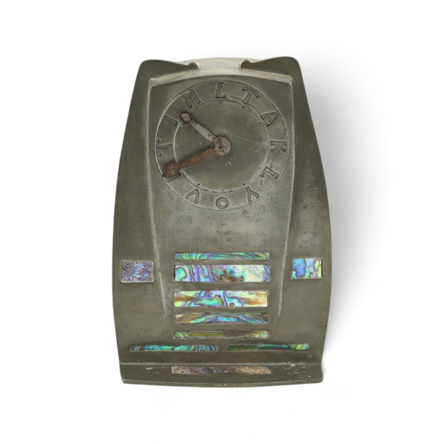 Archibald Knox for Liberty & Co. A Tudric abalone inlaid pewter timepiece c.1900